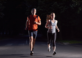 Joggers running at night