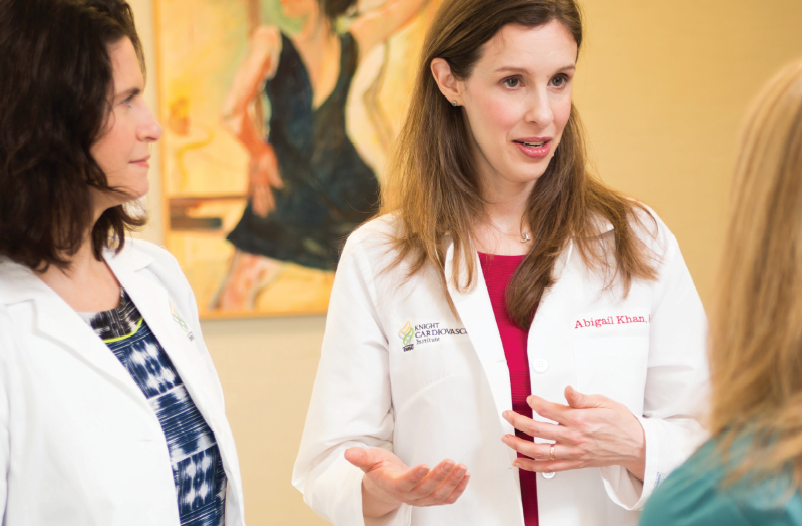 Dr. Pare and Dr. Khan speak with a patient
