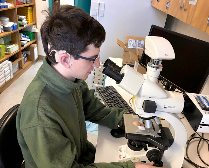 Brendan Cramer interned at OHSU to help scientists learn more about stem cells as a possible treatment for Usher Syndrome, which Creemer has.