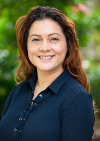 Yessica Santana wearing a navy blue shirt