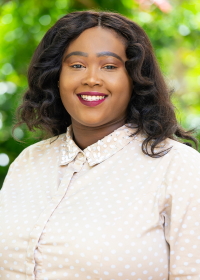 Dennisha King wearing a polka dotted shirt