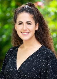 Raquel Miralles wearing a black polka dotted shirt