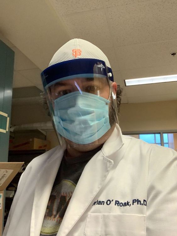Dr. Brian O'Roak in lab for COVID-19 sequencing resized