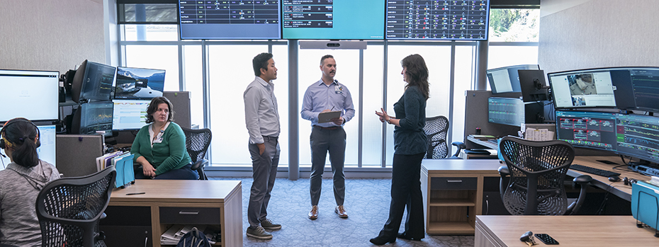 Members of the Office of Digital Health leadership team meet in the virtual ICU command center.