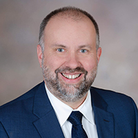 A professional photo of Mark Lovgren.