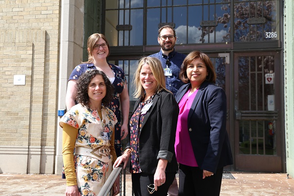 School of Medicine faculty development team in front of the OHSU Auditorium