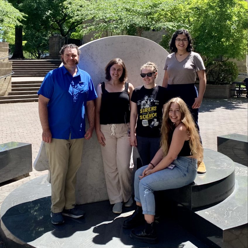 Dr. Brian O'Roak and four members of the 2023 O'Roak lab 