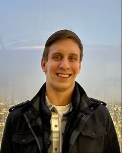 Headshot of current member Alec Furst 