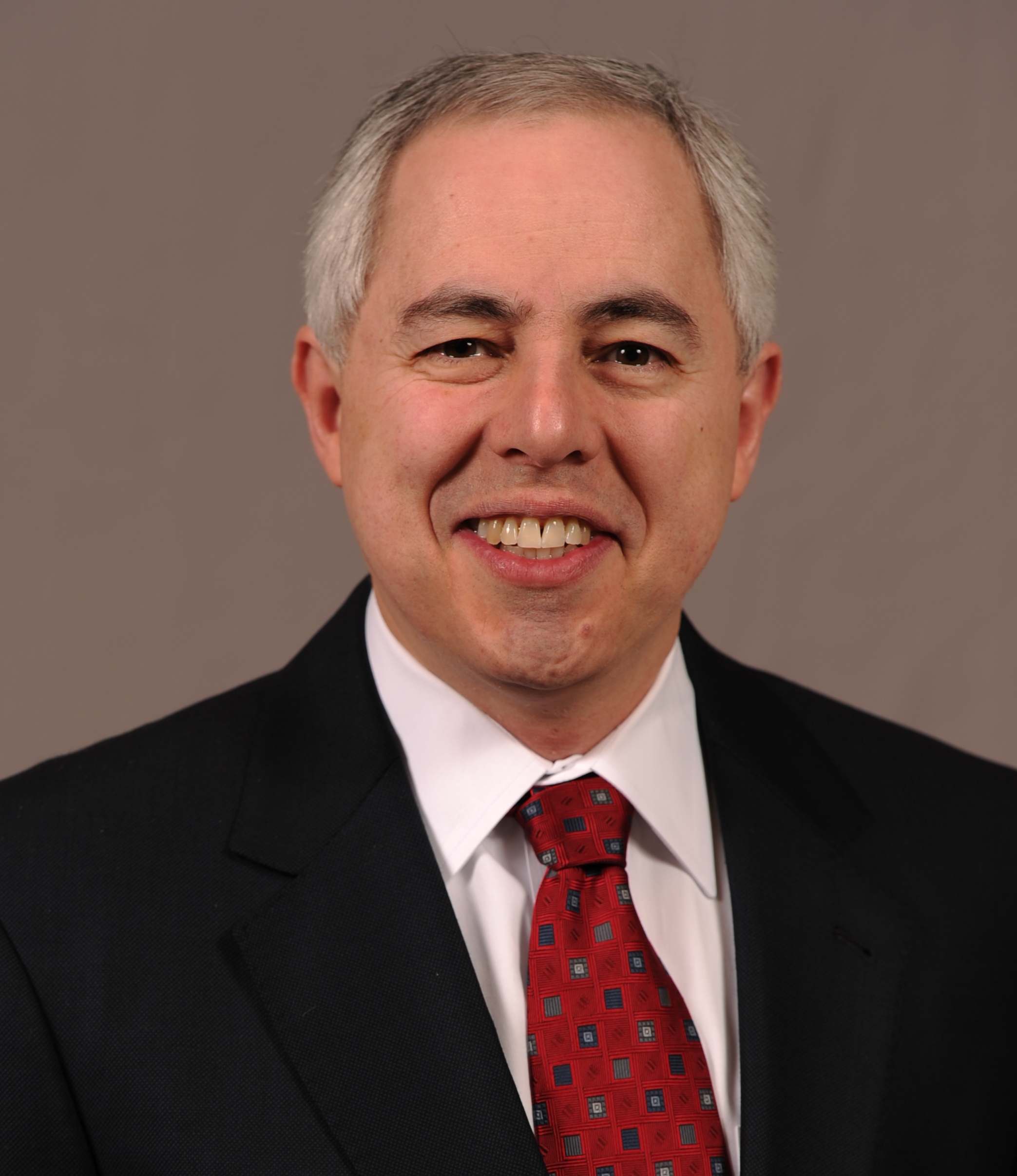 Dr. Dirk Elston smiles for a portrait