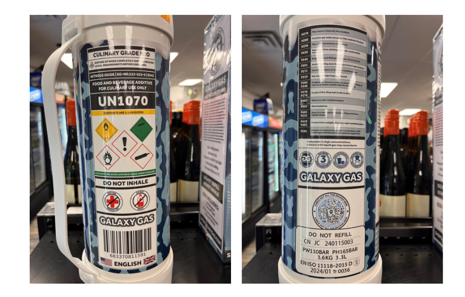 Front and back photos of a "Galaxy Gas" canister, a nitrous oxide product.