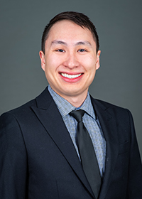 A professional headshot of Dr. Brandon Ngo.