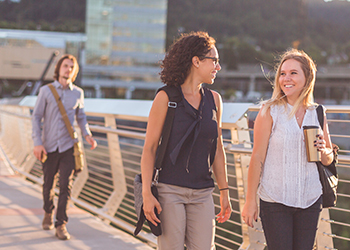 Students walking across Tilikum Crossing Bridge.