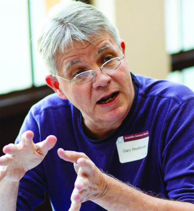 Dr Gary Westbrook speaking and emphasizing with his hands