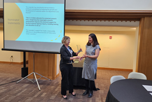 Dr. Andrea Cedfeldt presenting the 2025 Scientist Development Award to Ximena Levander, M.D., M.C.R.