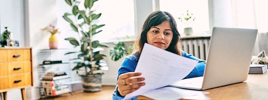 A female patient on a laptop