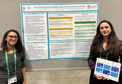 Zayna Sasha In front of presentation