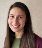 Professional portrait of Alex Dest, OCTRI Evaluation Assistance Program Manager.