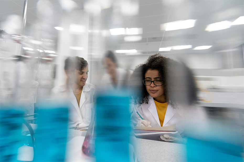 Graduate students conducting biomedical research in an OHSU laboratory.    